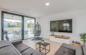 Et opholdsområde på Luxury Villa Weiss - Malinska - Heated Pool - Central floor heating in Winter - Osmosis System in kitchen