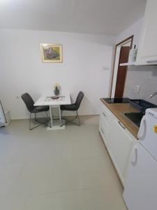 Kuchyň nebo kuchyňský kout v ubytování Apartments & room Ivica Split