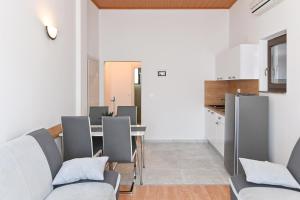 Kuchyň nebo kuchyňský kout v ubytování Apartments Andrea I