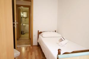 Giường trong phòng chung tại Apartment Pojatica Sumartin