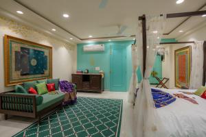 Letto o letti in una camera di Mangalmayee Heritage Home - Boutique Homestay