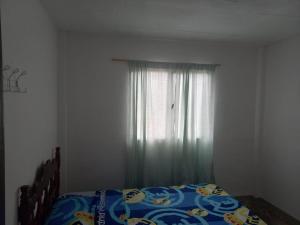 En eller flere senge i et værelse på Habitaciones Sencillas + 43 billeder