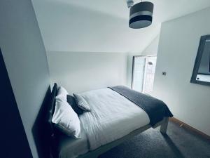 Postel nebo postele na pokoji v ubytování Wild Atlantic Way Rentals