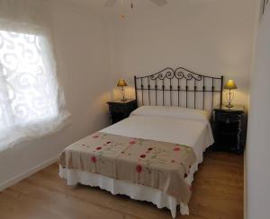 Postel nebo postele na pokoji v ubytování Precioso apartamento frente a la playa