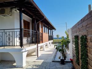 Μπαλκόνι ή βεράντα στο OASIS BEACH HOUSE