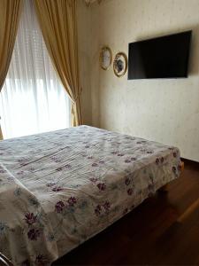 מיטה או מיטות בחדר ב-Villa Porto Selvaggio