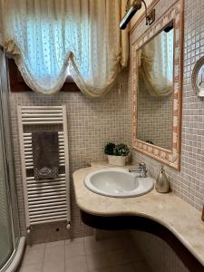 Vonios kambarys apgyvendinimo įstaigoje Villa Porto Selvaggio