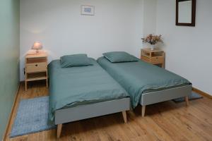 Krevet ili kreveti u jedinici u objektu Auberge du Vieux Pont