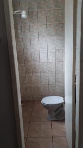 a small bathroom with a toilet in a room at Pousada São Manoel in Valença