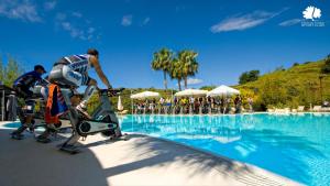 The swimming pool at or close to Mara's Apartments Higueron West - Like A House - 246 Square Meters of Private Terrace & Garden - Morning and Evening Sun