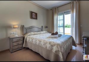 Postel nebo postele na pokoji v ubytování Nerja Zona playa de Burriana + 21 fotografií
