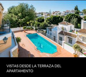Bazén v ubytování Nerja Zona playa de Burriana nebo v jeho okolí