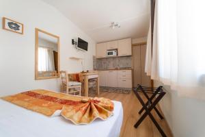 Μια τηλεόραση ή/και κέντρο ψυχαγωγίας στο Casa Vacanza San Pietro