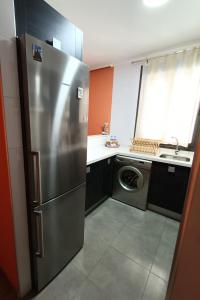 Kuchyň nebo kuchyňský kout v ubytování Apartamento El Zapillo + 10 fotografií
