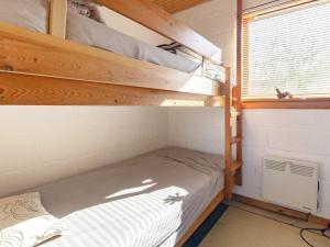 Postel nebo postele na pokoji v ubytování Holiday home Skals VI