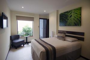 Postel nebo postele na pokoji v ubytování Isla Verde Hotel + 37 fotografií