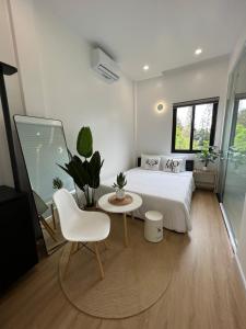 Ein Bett oder Betten in einem Zimmer der Unterkunft ANH’s HOUSE