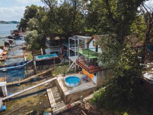 an aerial view of a house next to the water at Kuca na Savi in Belgrade