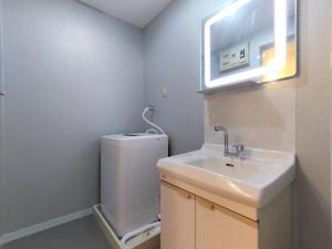 a bathroom with a sink and a toilet at Classic/modern Japanese-style 2rooms/3mins to Sta/8P in Tokyo