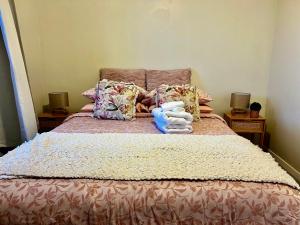 Posteľ alebo postele v izbe v ubytovaní City Garden Retreat