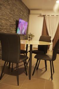 TV a/nebo společenská místnost v ubytování The Crib + 4 fotografie