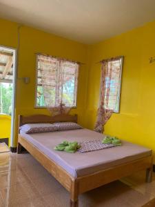Katil atau katil-katil dalam bilik di Xylla Guesthouse