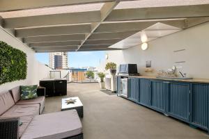 Χώρος καθιστικού στο Unit 65 Grand Pacific Resort Bulcock St Caloundra