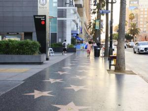 a sidewalk with stars painted on the ground at Your Charming Boho Abode in Los Angeles