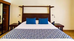 Ein Bett oder Betten in einem Zimmer der Unterkunft Catalonia Yucatan Beach - All Inclusive