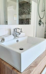 Koupelna v ubytování B&B Greco Home