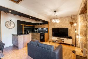 Kuchyňa alebo kuchynka v ubytovaní Superbe appartement, situé au cœur de la ville.