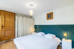 Posteľ alebo postele v izbe v ubytovaní Superbe appartement, situé au cœur de la ville.