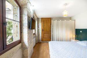 Posteľ alebo postele v izbe v ubytovaní Superbe appartement, situé au cœur de la ville.