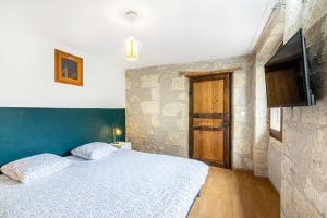 Posteľ alebo postele v izbe v ubytovaní Superbe appartement, situé au cœur de la ville.
