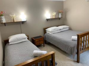 Ένα ή περισσότερα κρεβάτια σε δωμάτιο στο Bella Nicola