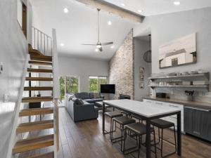 a kitchen and living room with a table and chairs at Park City Canyons Ski Cabriolet Community Amenity in Park City