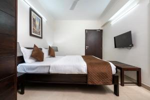 Postel nebo postele na pokoji v ubytování Palm Stay - Studios & Rooms