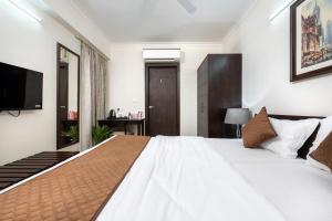 Postel nebo postele na pokoji v ubytování Palm Stay - Studios & Rooms