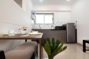 Kuchyň nebo kuchyňský kout v ubytování Palm Stay - Studios & Rooms