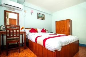 Voodi või voodid majutusasutuse Thamel Eco Home toas