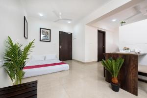 Postel nebo postele na pokoji v ubytování Palm Stay - Studios & Rooms