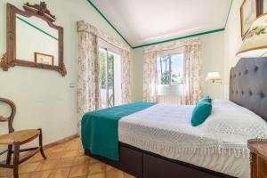 A bed or beds in a room at Finca Santa Maria Near Palma