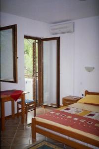 Posteľ alebo postele v izbe v ubytovaní Apartments Pinus