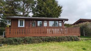 Aed väljaspool majutusasutust Snowdonia Log cabin +18 fotot