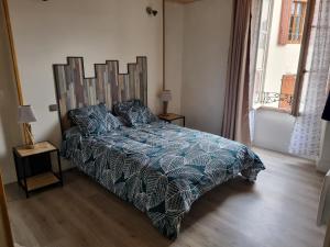 Łóżko lub łóżka w pokoju w obiekcie Maison la vague