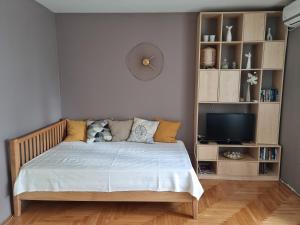 Llit o llits en una habitació de Stan na dan "Irina" Banja Luka