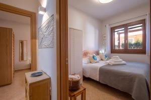 A bed or beds in a room at Villaelena Még 37 kép