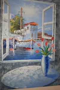 a painting of a vase with flowers on a table at Villa Italiana in Agios Nikolaos