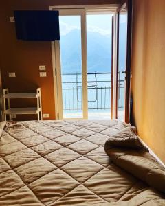 A bed or beds in a room at Villa Castello only room