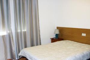 Postel nebo postele na pokoji v ubytování Apartment Gandia Playa Venecia